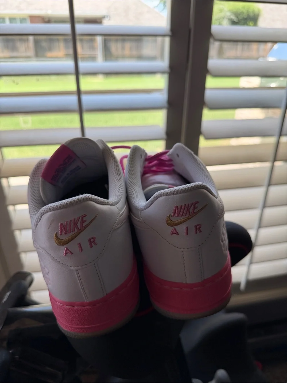 Nike White Sneakers with Pink Swoosh and Accents